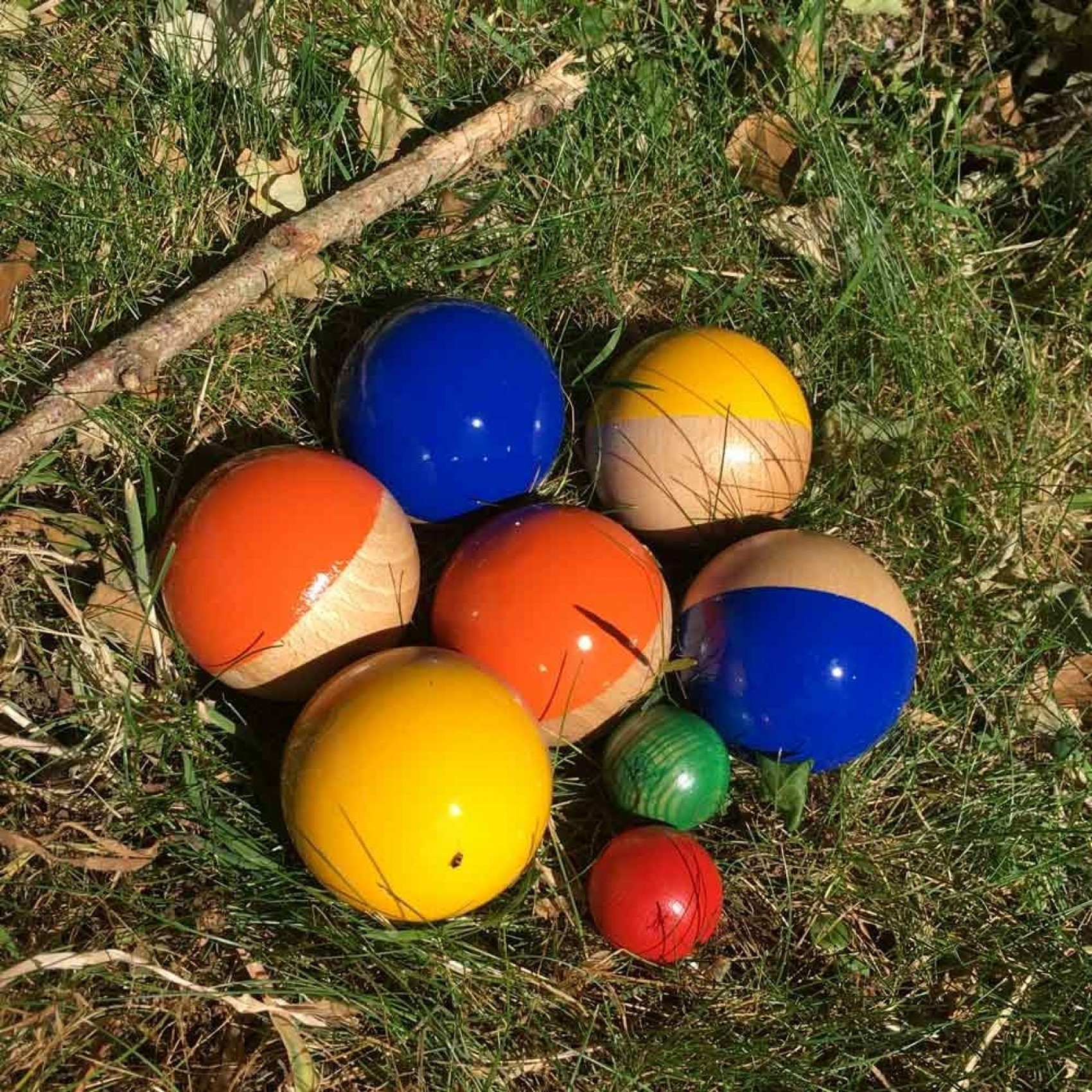 10 cochonnets en bois colorés pour pétanque - Boutique BCD JEUX